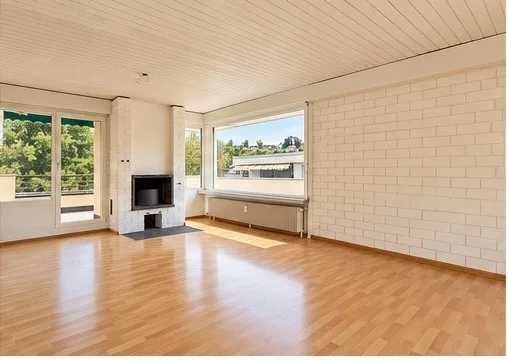 Appartement spacieux 4.5 pièces avec cheminée et terrasse étendue – photo 3 sur 12