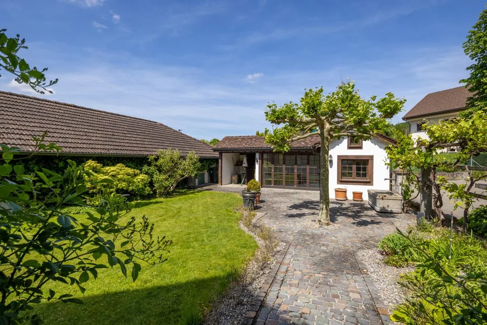 Ambiance historique dans une maison mitoyenne rénovée avec un paradis de jardin