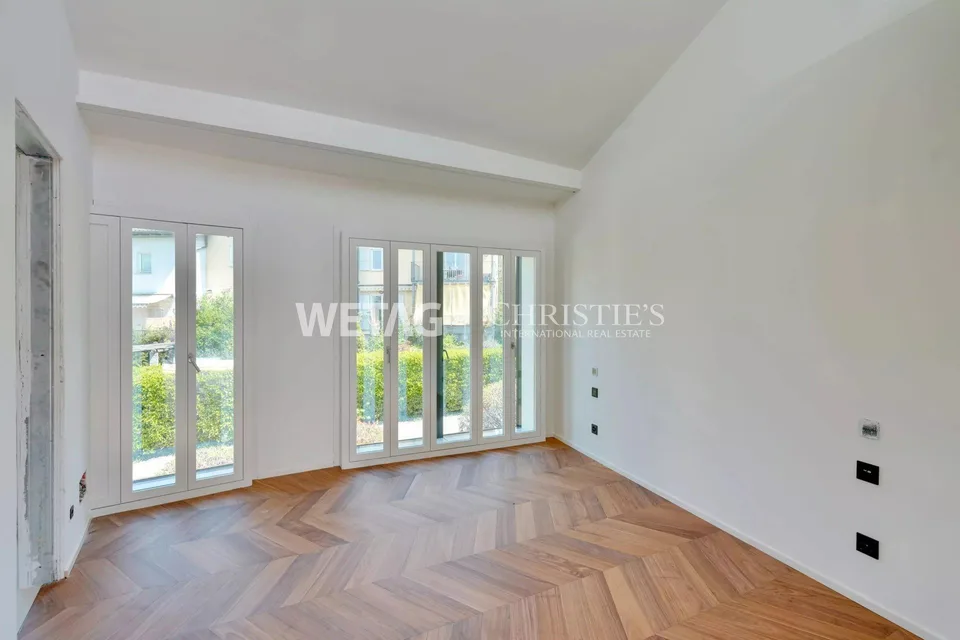 Appartement spacieux, entièrement rénové de 4,5 pièces à vendre à Lugano-Comano, idéal comme première ou seconde résidence