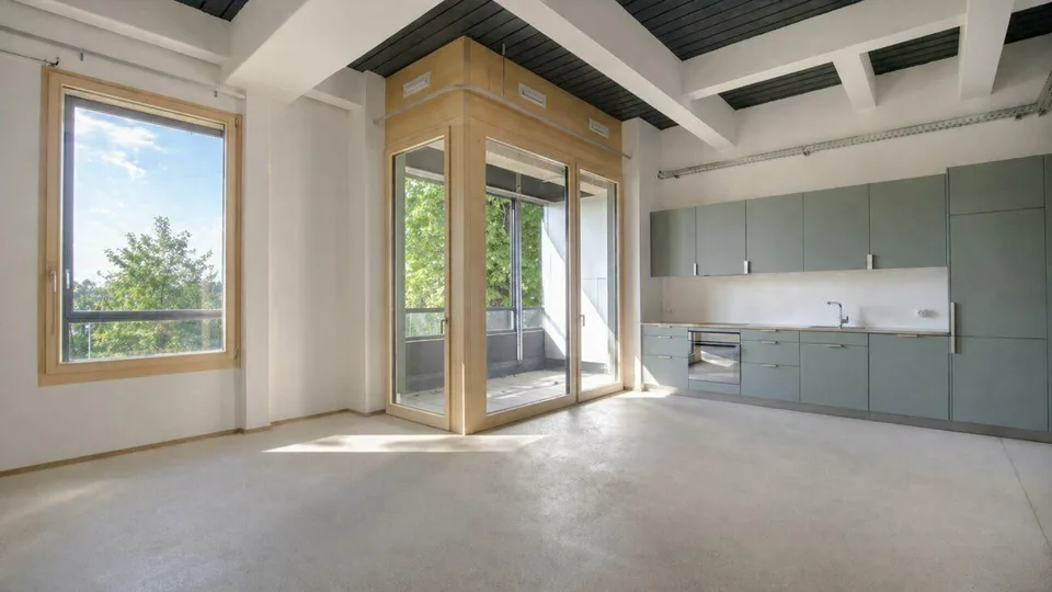 Appartement maisonnette spacieux sur le Rhin avec charme industriel