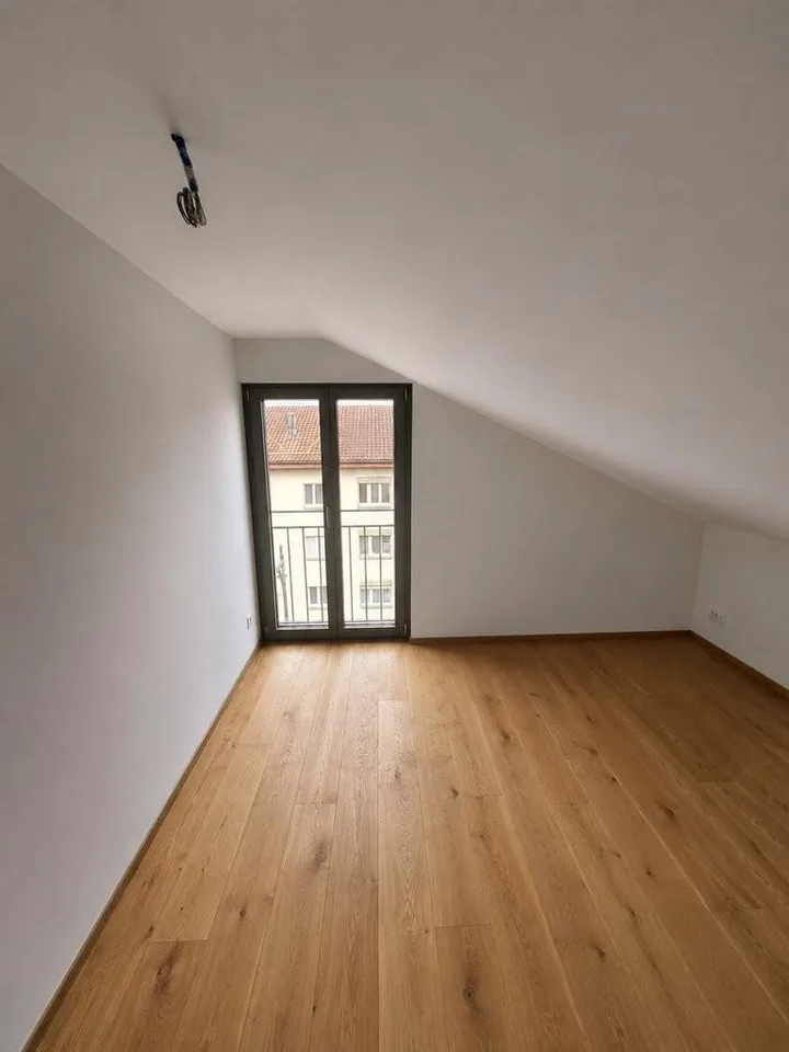 Premier occupation - Appartement de 3,5 pièces en mansarde à droite au 4e étage avec ascenseur