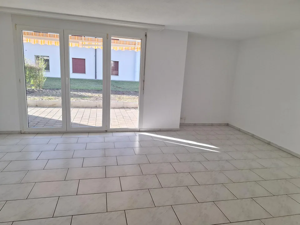 Ampio appartamento di 4.5 locali con posto a sedere in giardino