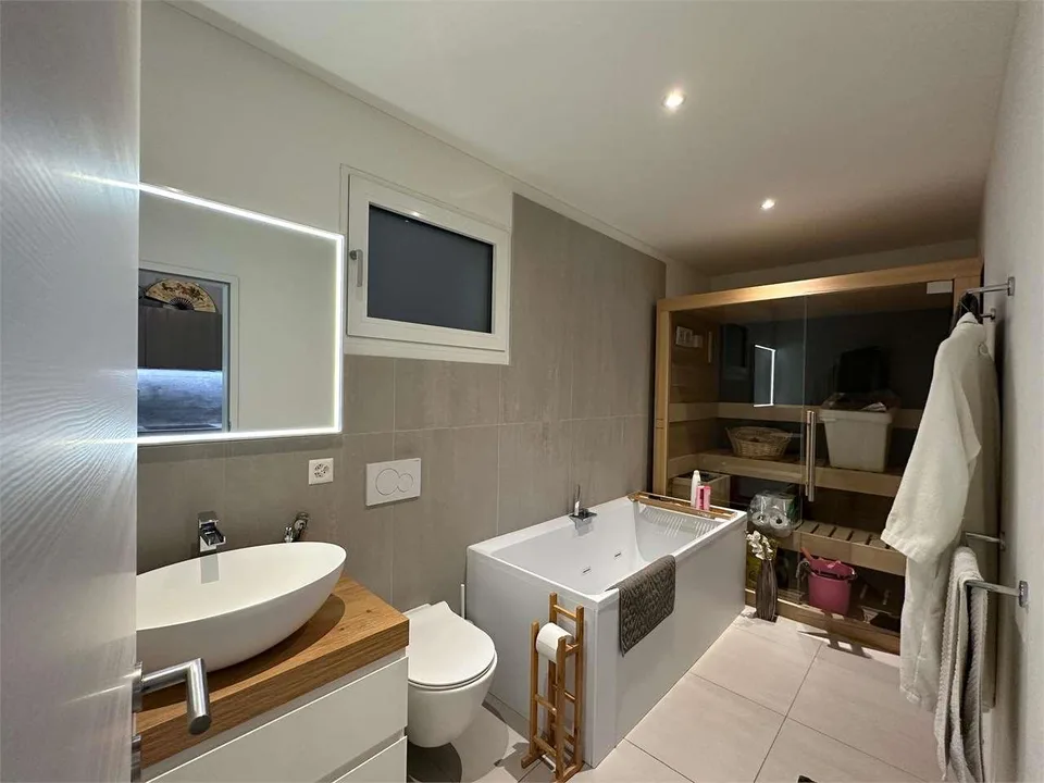 Appartement raffiné de 3,5 pièces avec jardin privé à Sorengo – photo 10 sur 12
