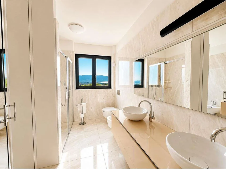 Penthouse exclusif avec jardin sur le toit et vue panoramique sur le lac de Lugano – photo 9 sur 12