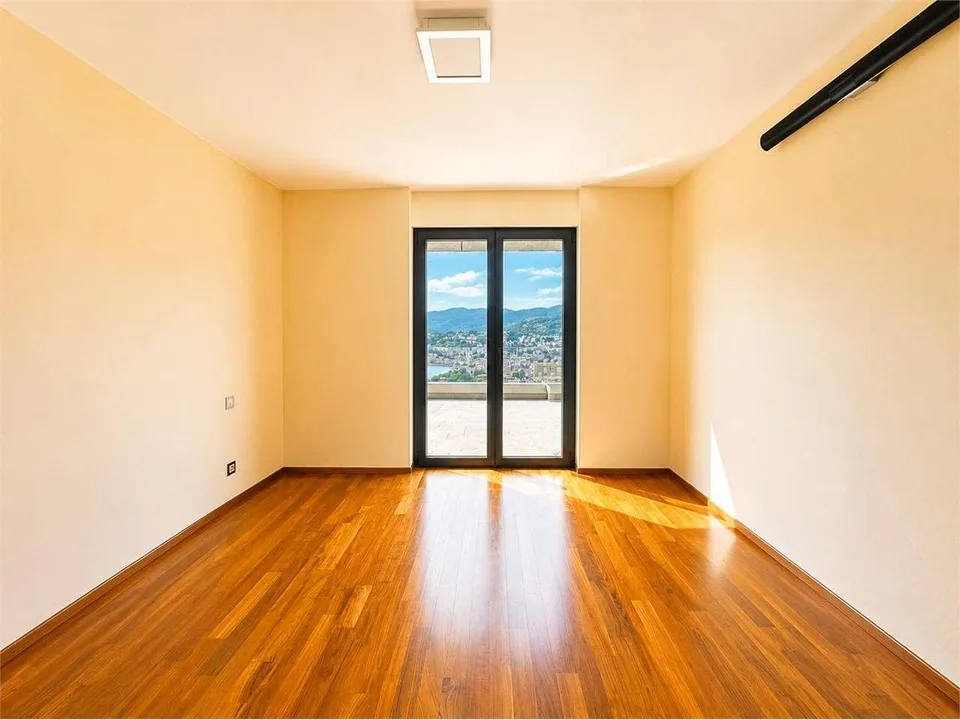 Penthouse exclusif avec jardin sur le toit et vue panoramique sur le lac de Lugano – photo 8 sur 12