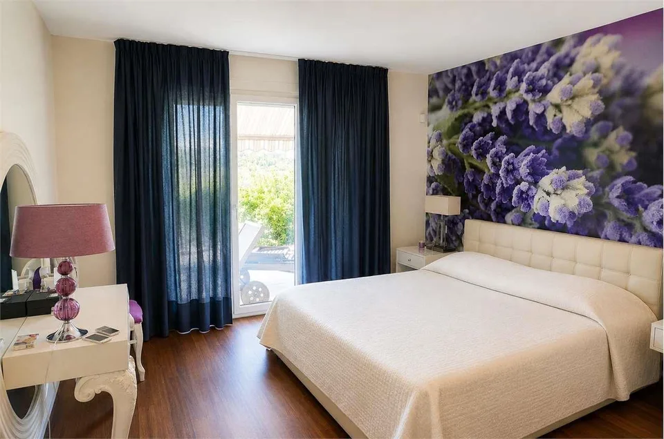 Esclusivo duplex di 4.5 locali con giardino privato e spettacolare vis