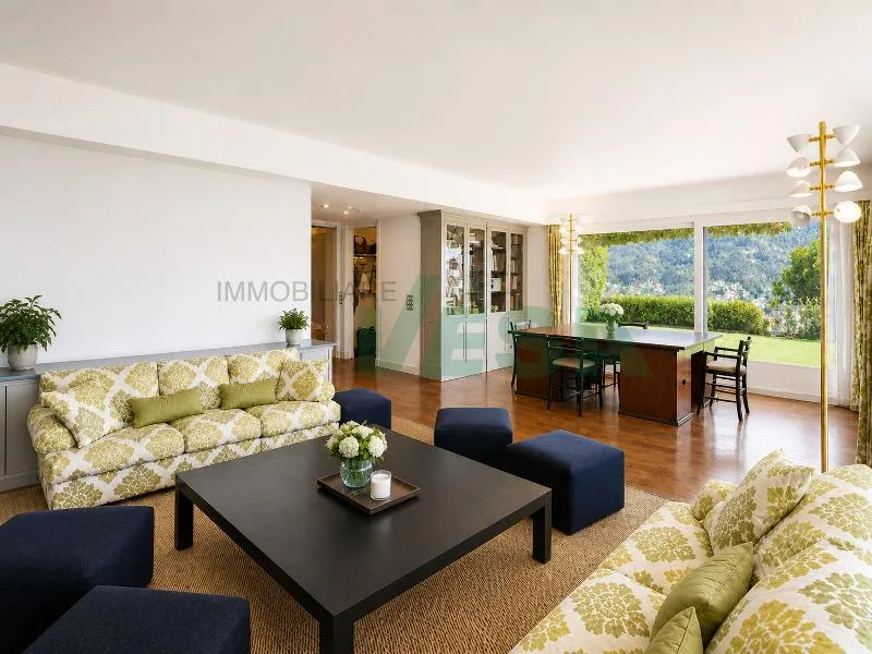 Splendido attico 6,5 locali con fantastica vista lago e bel giardino