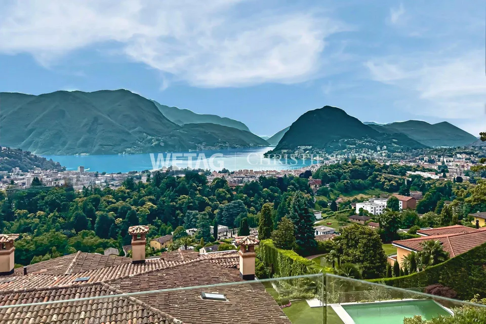 Elegante Triplex-Wohnung in Porza mit Seeblick, privatem Garten, Ge...