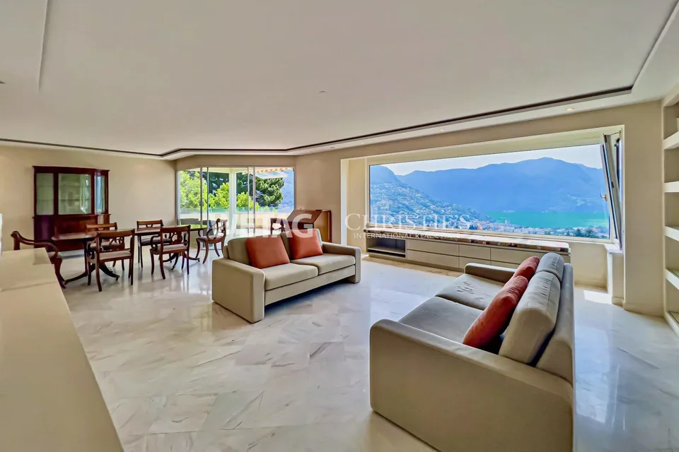 Elegante Triplex-Wohnung in Porza mit Seeblick, privatem Garten, Ge...