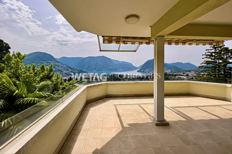 Elegante appartamento triplex a Porza con vista lago, giardino privato, piscina e sauna comuni in vendita – foto 8 di 13