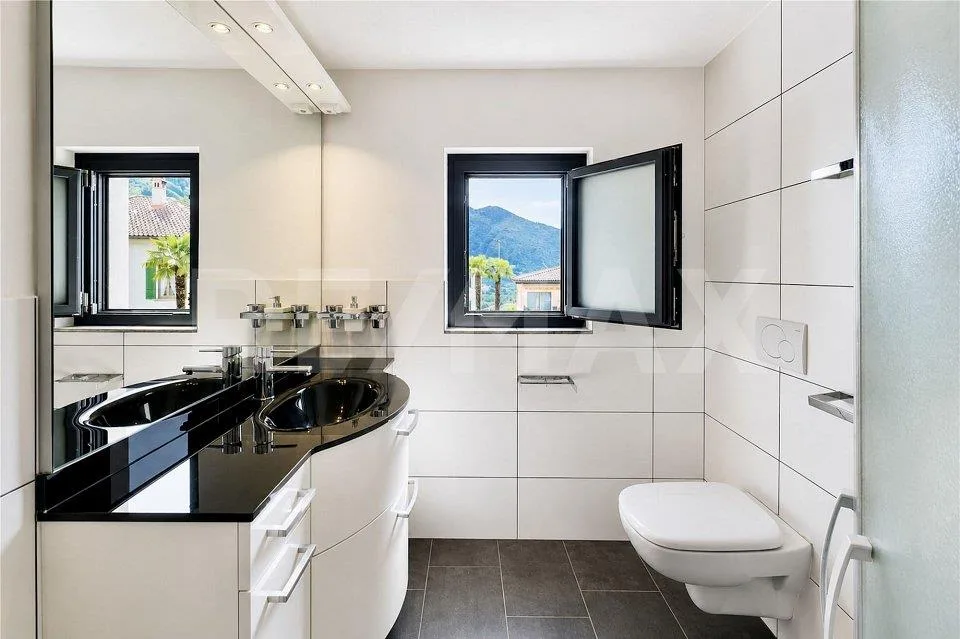 Casa con giardino e 4 posteggi – Foto 9 von 12