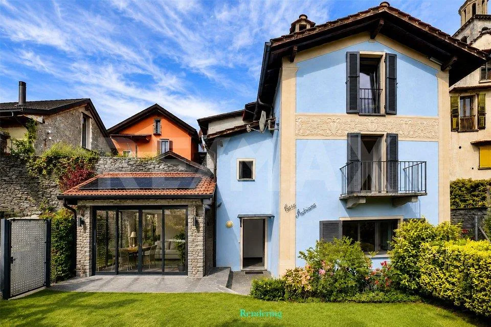 Casa con giardino e 4 posteggi