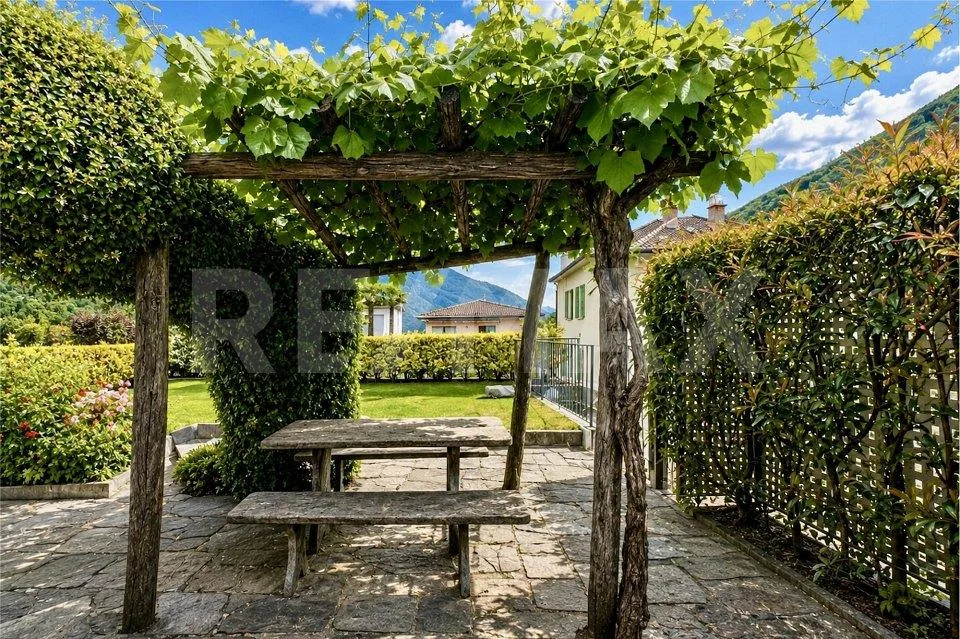 Casa con giardino e 4 posteggi – Foto 12 von 12