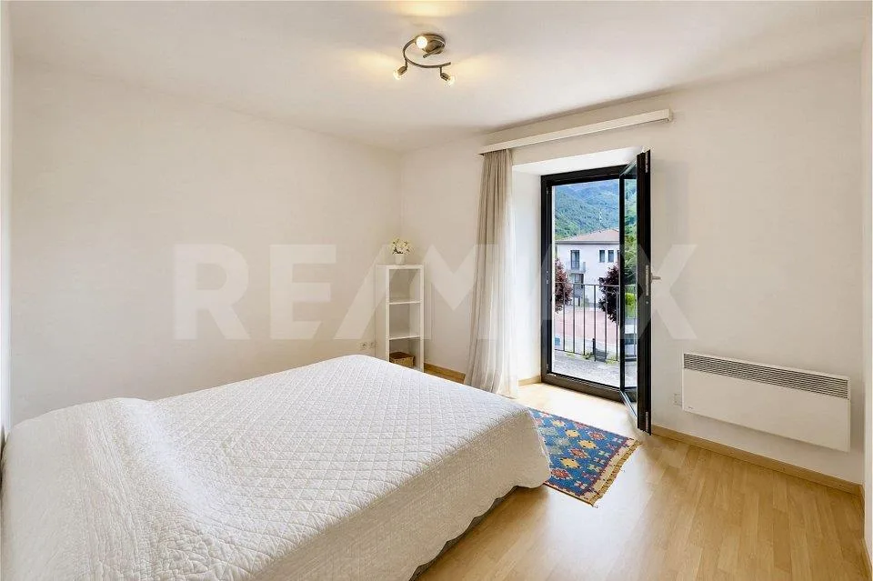 Casa con giardino e 4 posteggi – Foto 6 von 12
