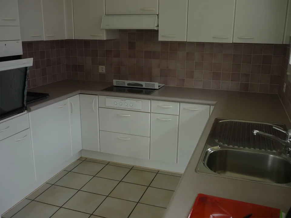 Appartement spacieux 3,5 pièces avec balcon et accès direct à l'espace de jardin