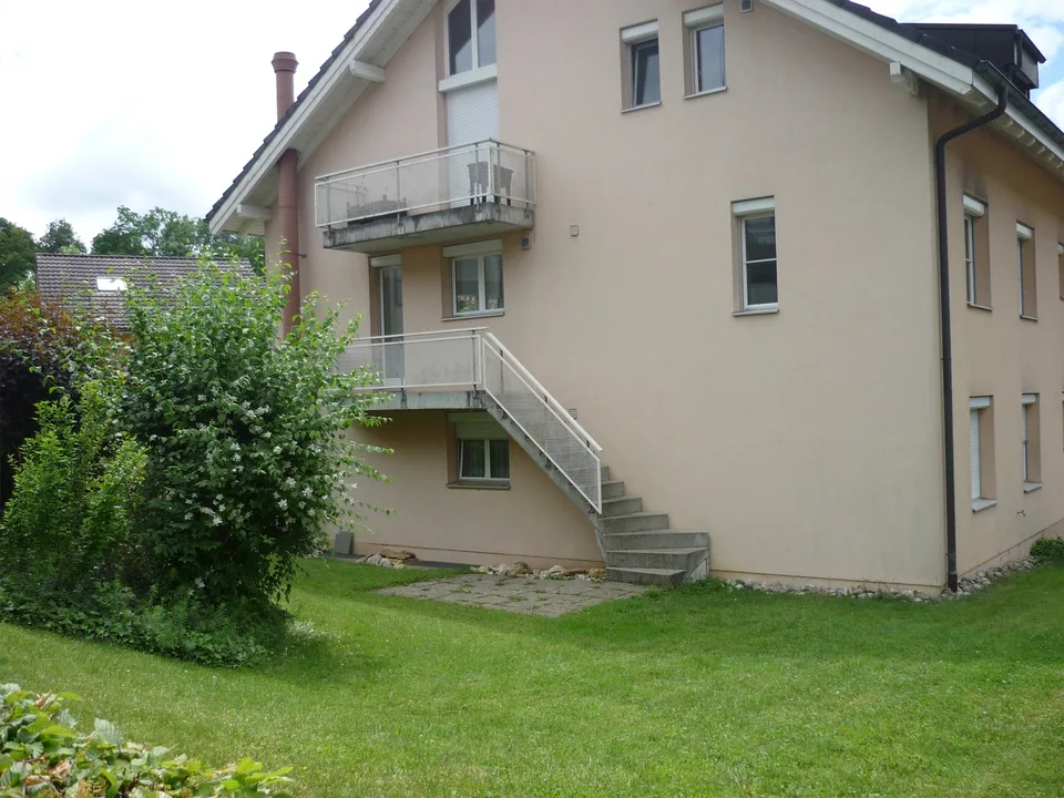 Appartement spacieux 3,5 pièces avec balcon et accès direct à l'espace de jardin