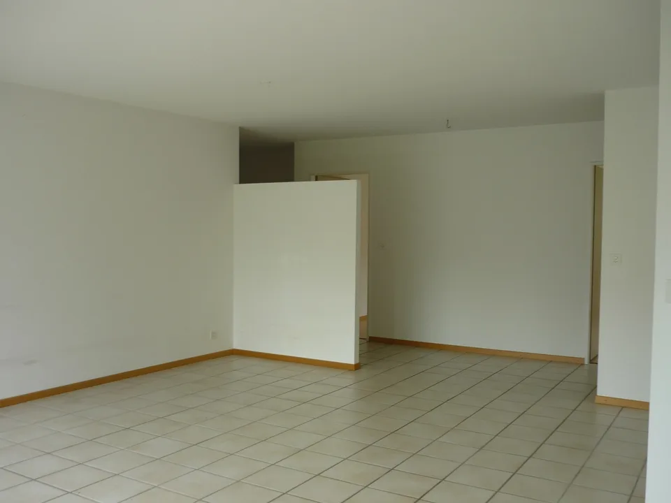 Appartement spacieux 3,5 pièces avec balcon et accès direct à l'espace de jardin