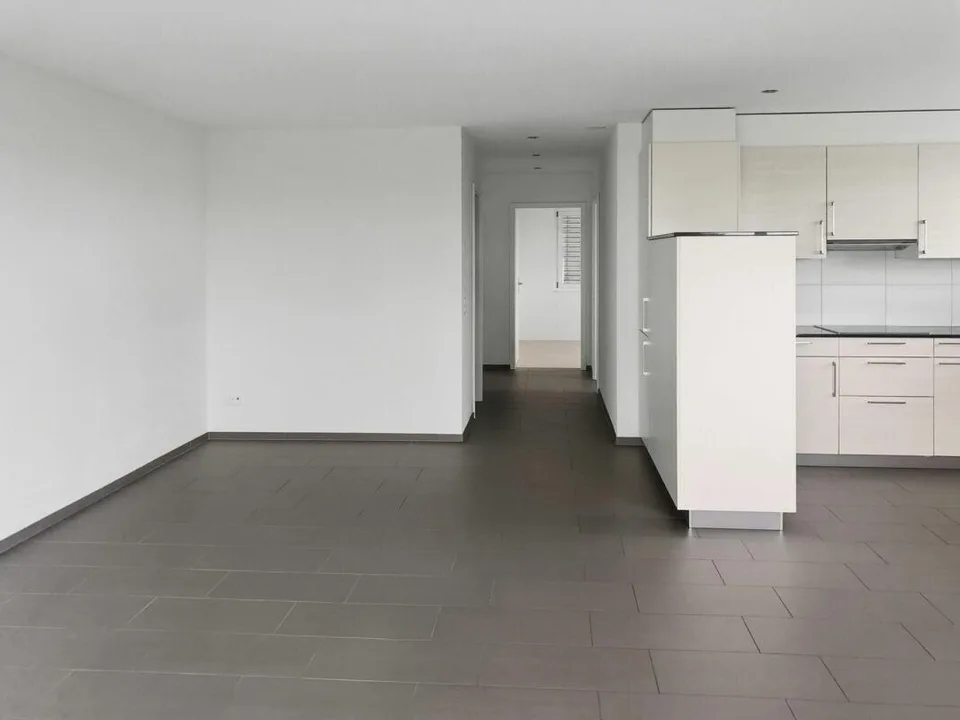 Appartamento attraente di 4.5 locali con balcone soleggiato