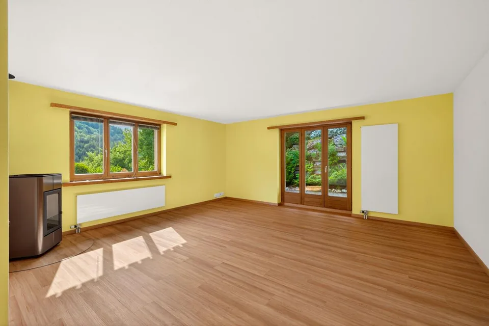 Chur: affascinante casa unifamiliare con giardino spazioso e vista sulla montagna