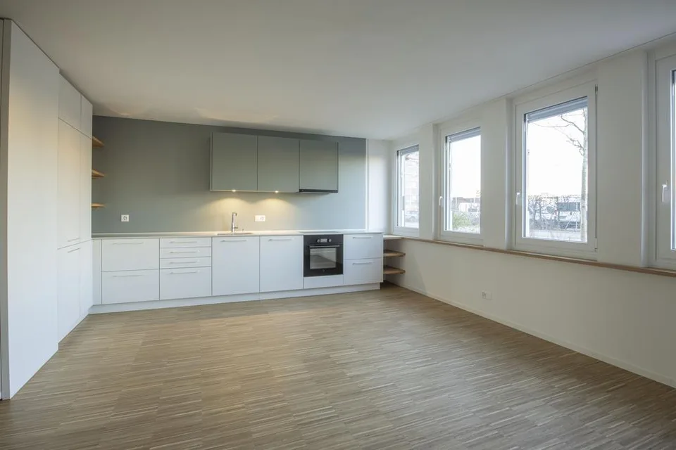 Moderne Wohnung mit Gartensitzplatz und eigenem Waschturm