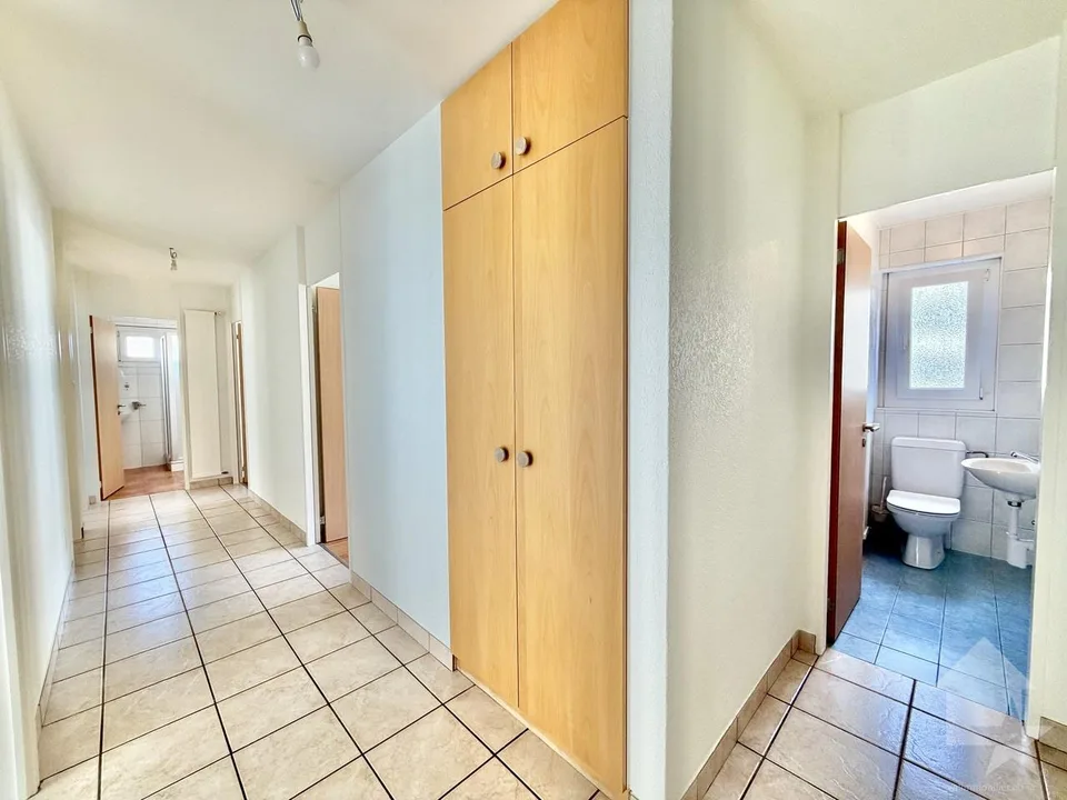 Crossing apartment of 115 m2, garage box, park, cellar and attic!
