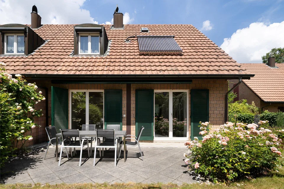 Einfamilienhaus mit Garten und Garagebox