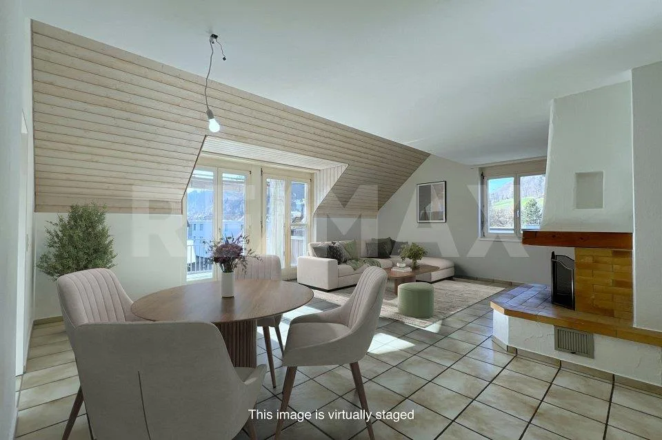 Bright 4.5-room attic apartment with balcony in a quiet location