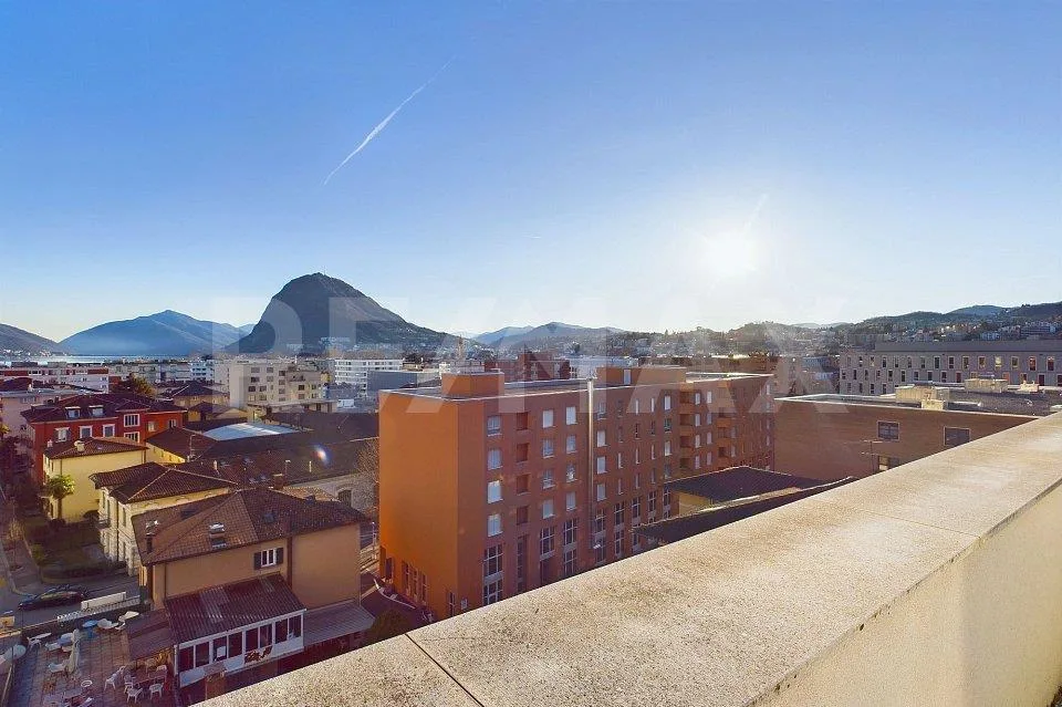 Elegante Attico con vista parziale sul Lago di Lugano – Foto 6 von 13