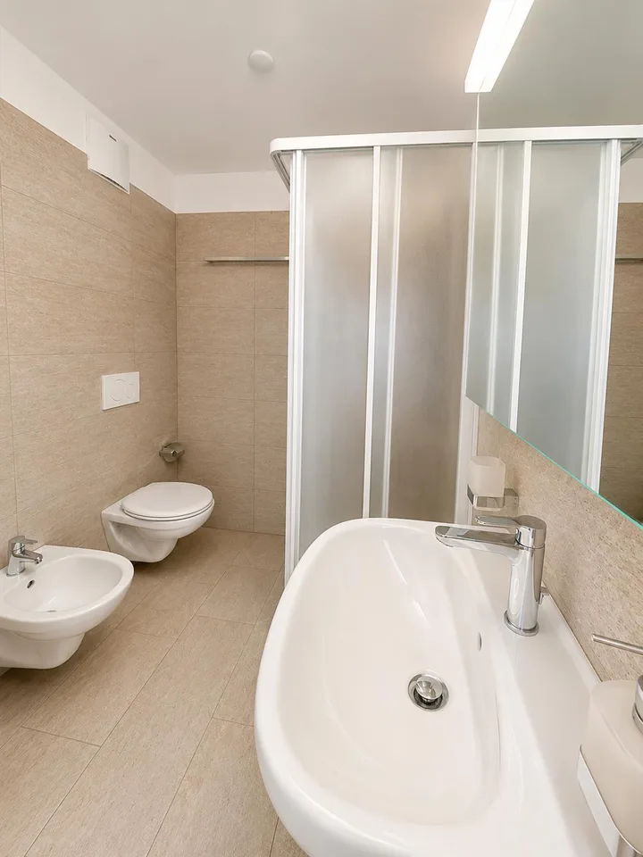 Manno_Elegante 2.5 locali con ampio patio privato al piano terra