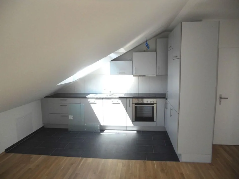 Bright 2.5-room attic apartment with large balcony