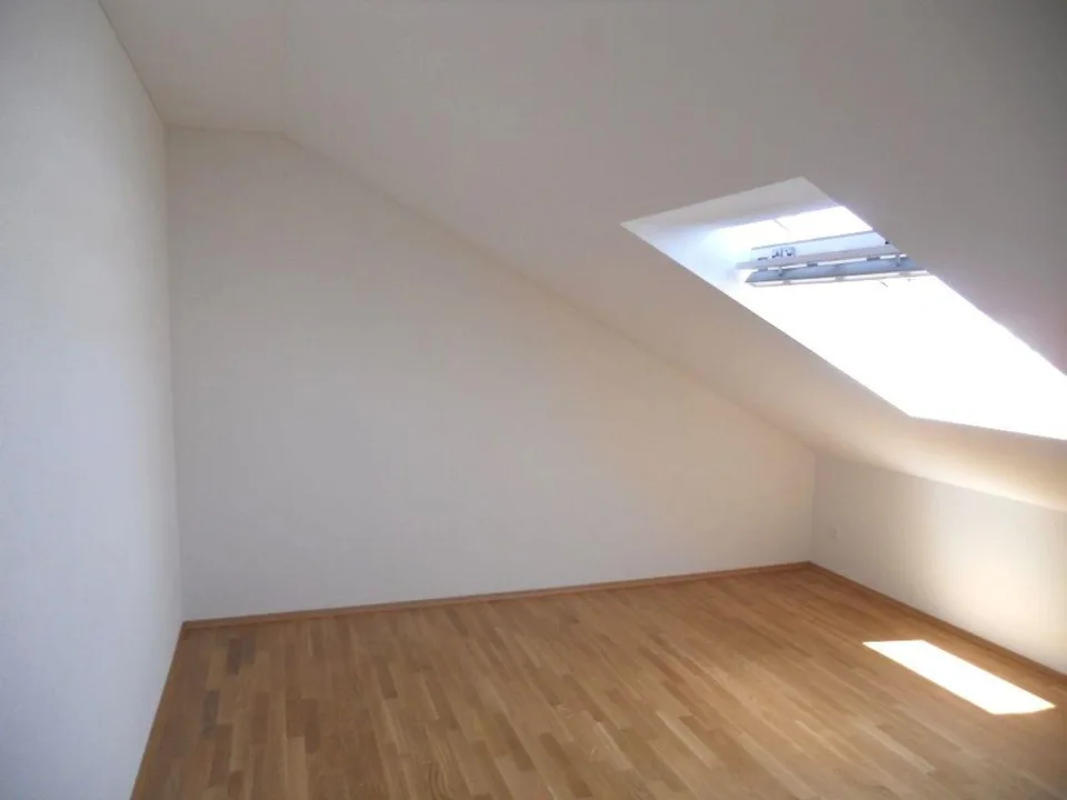 Bright 2.5-room attic apartment with large balcony