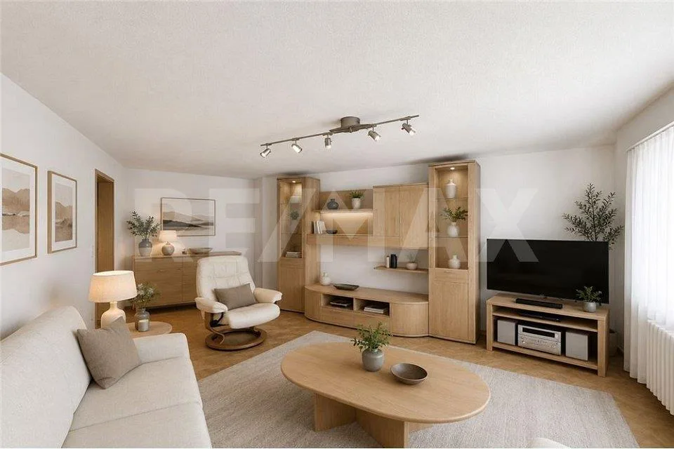 Ampio appartamento di 2,5 locali con balcone e vista sulla montagna - ideale per vivere o affittare