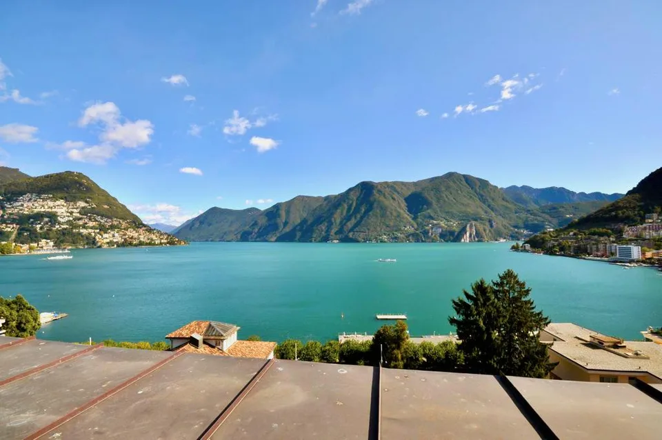 Villa Clelia - Attico con Vista Lago di Lugano in Palazzo d'Epoca