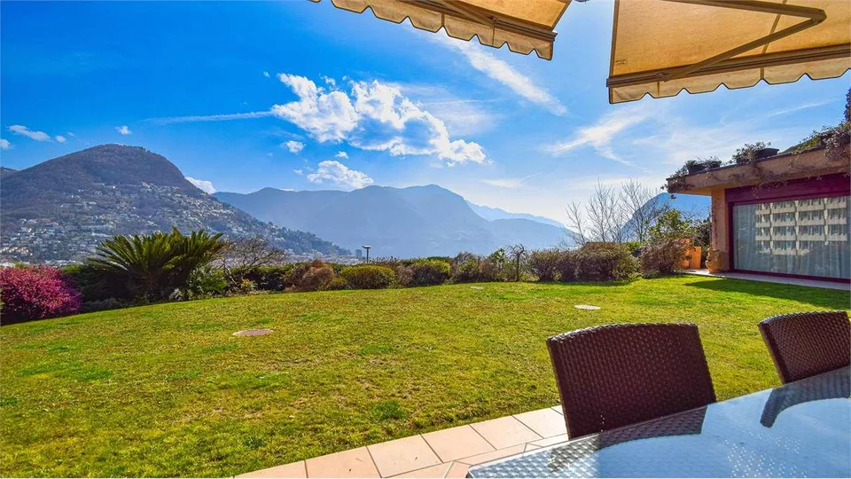 PRESTIGIOSO APPARTAMENTO CON GIARDINO E VISTA LAGO
