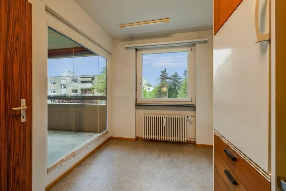 Appartement 4 pièces lumineux dans un quartier calme avec place de parking