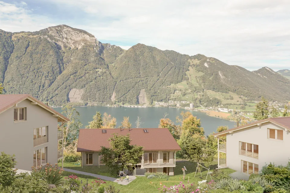 Appartement de jardin neuf avec vue sur la montagne et le lac partiel à Seelisberg