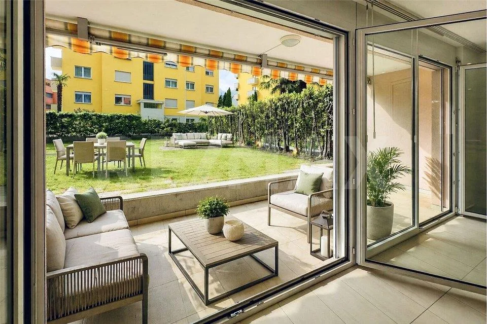 Moderno appartamento di 3.5 locali con giardino vicino ai negozi – Foto 7 von 13