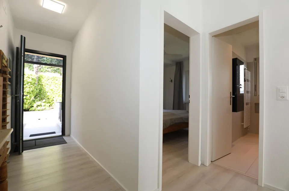 Moderne 2.5-Zimmer-Dachwohnung mit Traumblick in Orselina – Foto 12 von 16