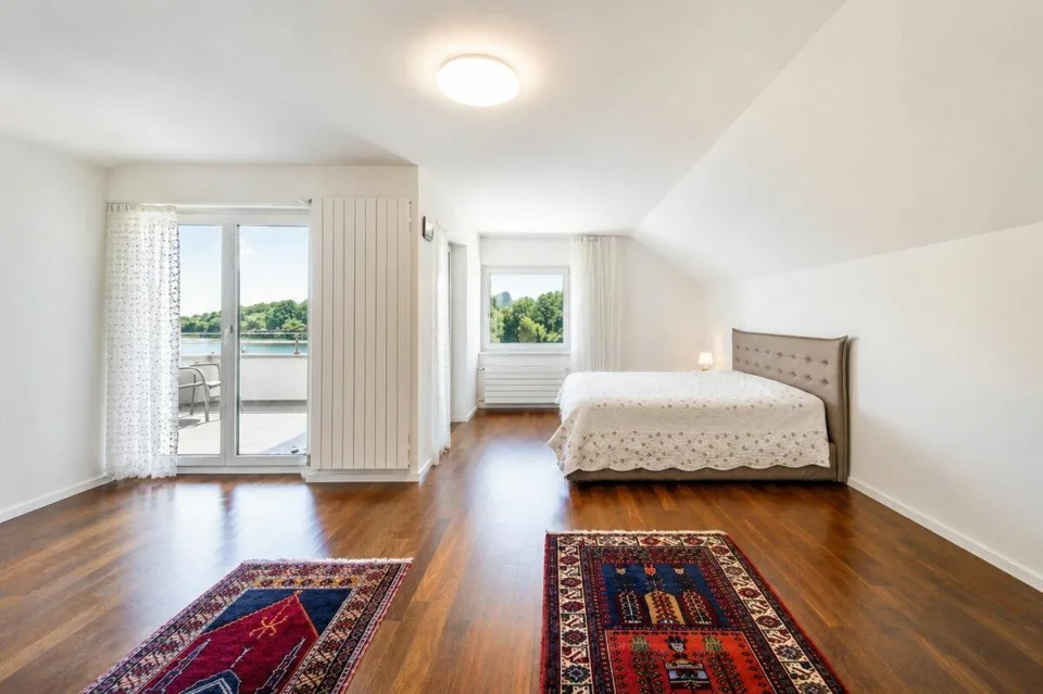 Luxuriöses Wohnen direkt am Rhein - exklusives 6.5-Zimmer-Einfamilienhaus mit traumhafter Aussicht – Foto 12 von 36