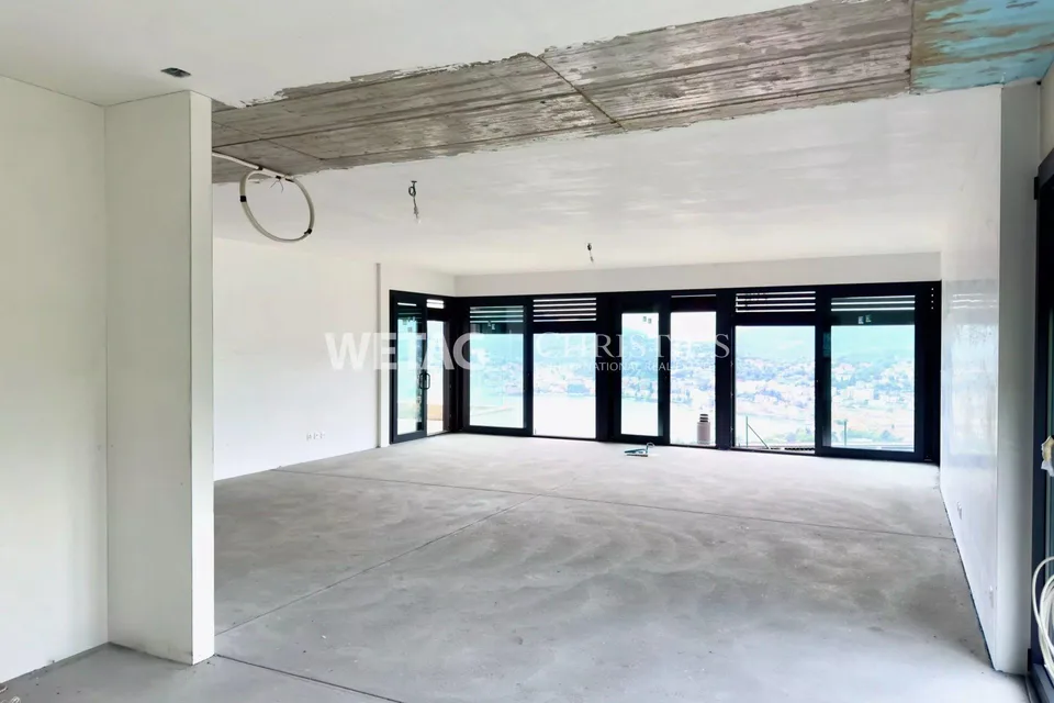 Appartamento in stato grezzo a Lugano-Albonago con giardino privato & vista sul lago ? perfetto anche come residenza di vacanza