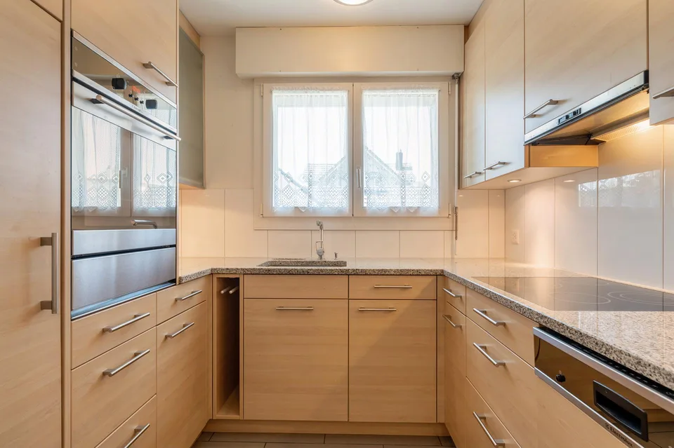 Casa a due famiglie con carattere in un quartiere residenziale tranquillo