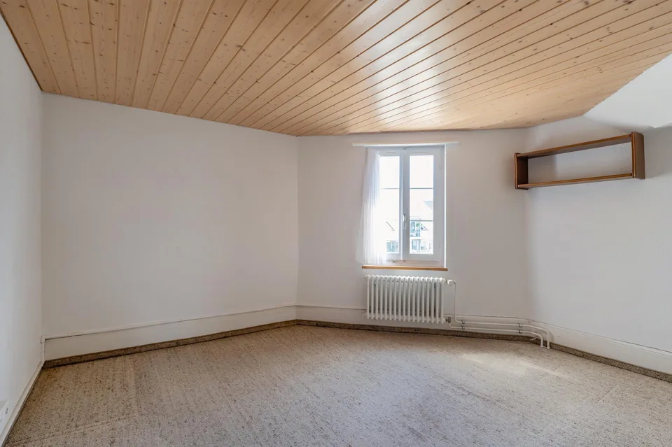Casa a due famiglie con carattere in un quartiere residenziale tranquillo