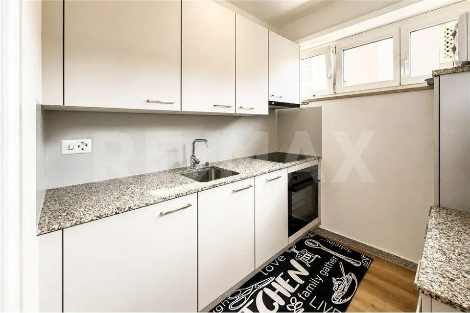 2.5 locali tra lago e centro – Foto 9 von 13