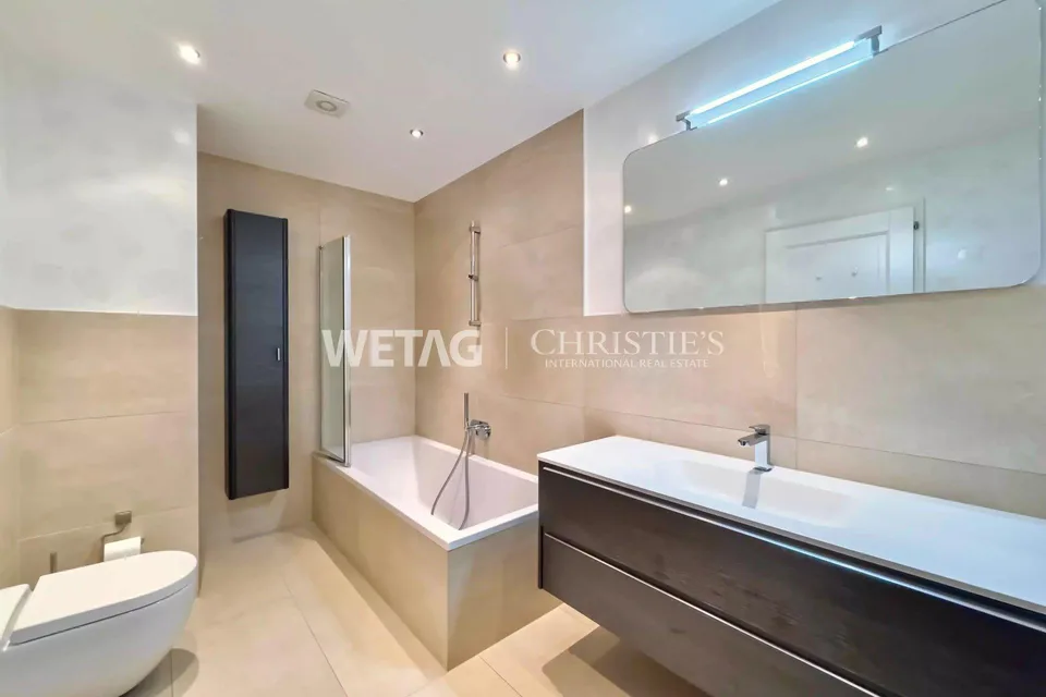 Elegante Villa in Lugano-Neggio mit freiem Blick auf den Luganersee, ideal auch als Zweitwohnsitz – Foto 9 von 11