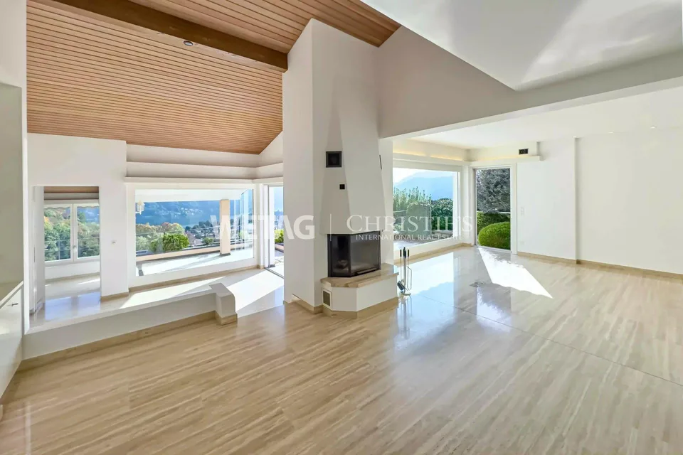 Elegante Villa in Lugano-Neggio mit freiem Blick auf den Luganersee, ideal auch als Zweitwohnsitz – Foto 8 von 11