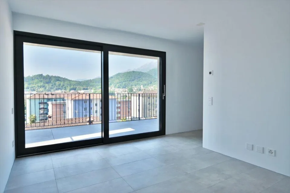 Attikawohnung mit Dachterrasse in neuer Residenz | Attico con grand...