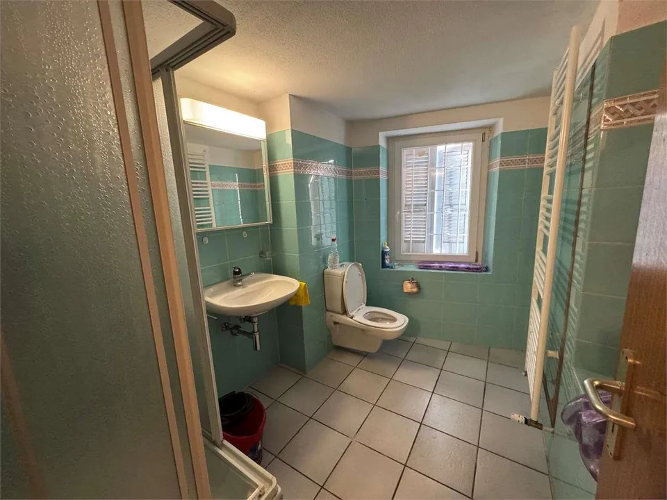 Hausreihe, umgeben von Grün mit offenem Blick in San Vittore