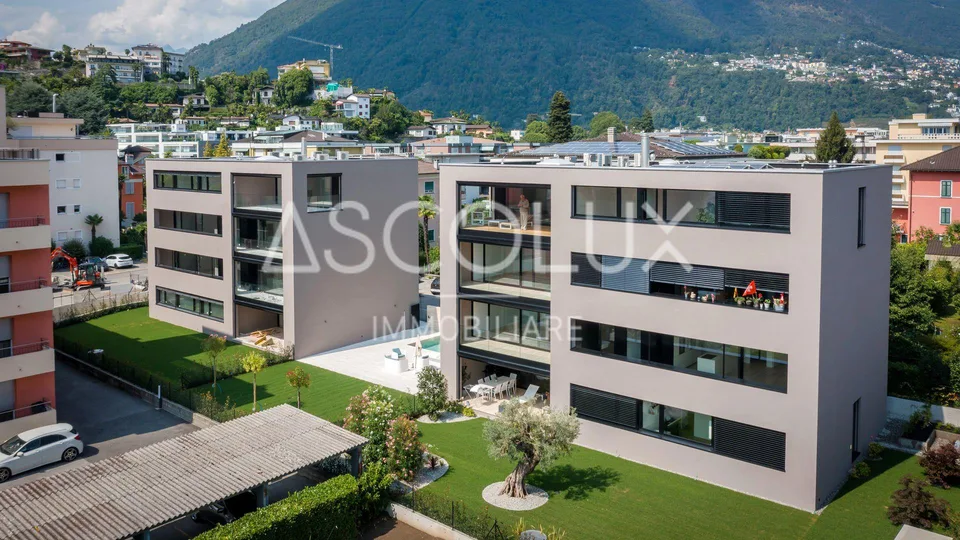 Moderno Appartamento 2.5 locali in residenza con spazio piscina esterna riscaldata e sauna