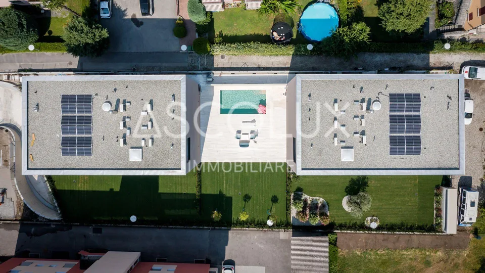 Moderno Appartamento 2.5 locali in residenza con spazio piscina esterna riscaldata e sauna