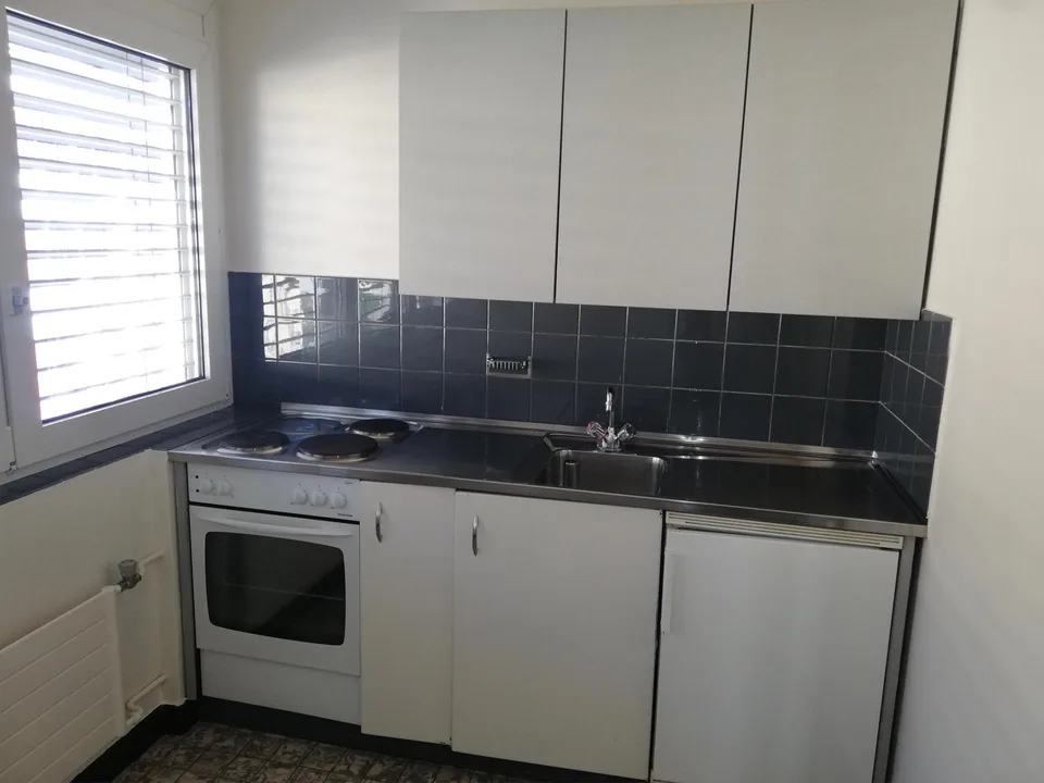 Studio dans un immeuble avec ascenseur